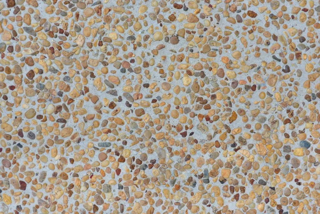 Exposed aggregate concrete driveway surface detail